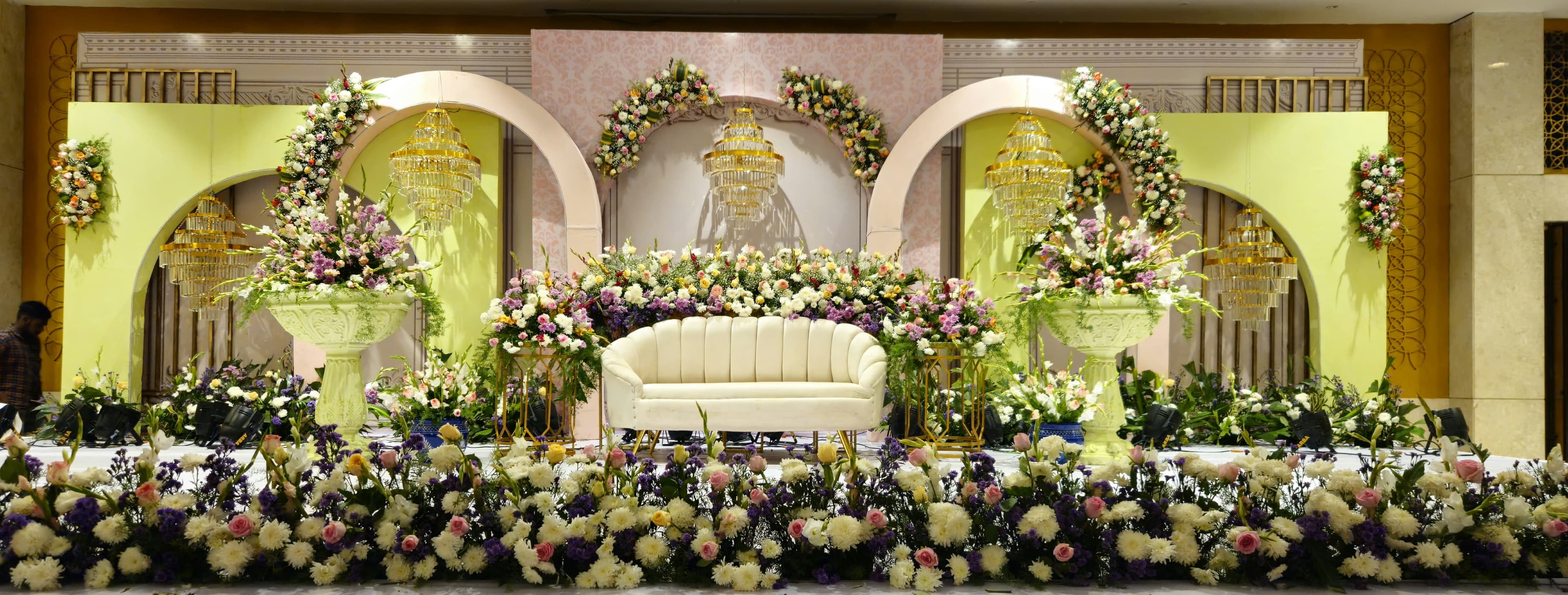 Reception stage · floral arch